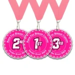 Pink BMX breast cancer awareness race medallions with first, second, and third place designs, featuring pink ribbons and Race For Breast Cancer text on pink ribbons, custom awards by BML Trophies and Awards.