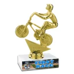 Custom BMX First Race trophy featuring a gold BMX rider figurine, white marble base, Daytona BMX track graphic, and First Race title.