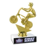 Custom BMX First Race trophy with gold BMX rider figure, white marble base, and Hardesty National BMX Stadium Tulsa OK event logo.
